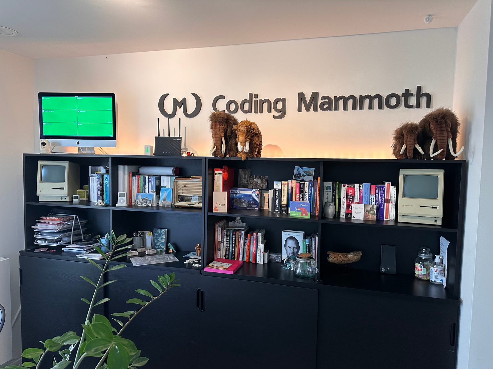 iMac 5K running a Debian headless kiosk status dashboard in the office.